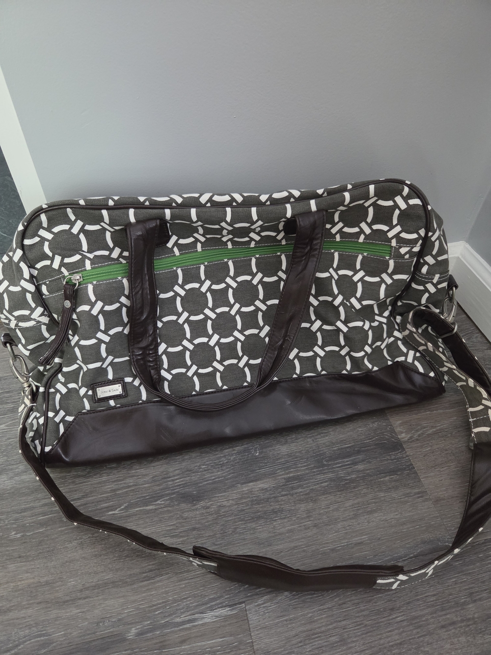 Patterned Gray & White Duffel Bag with Green Zipper Accent